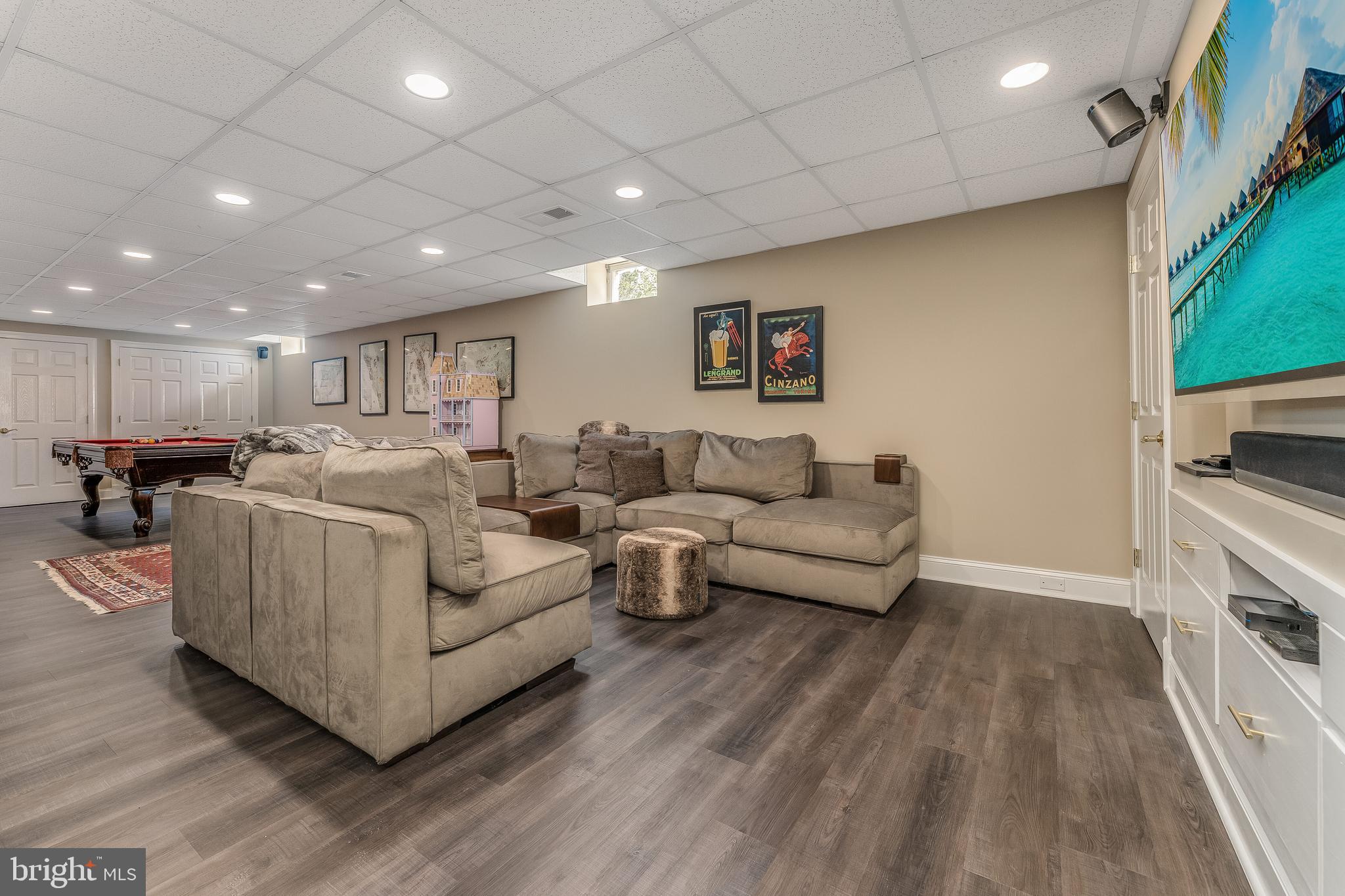 27 Milestone Drive Ringoes, NJ 08551 - Photo 45 of 75 a living room with furniture and a wooden floor