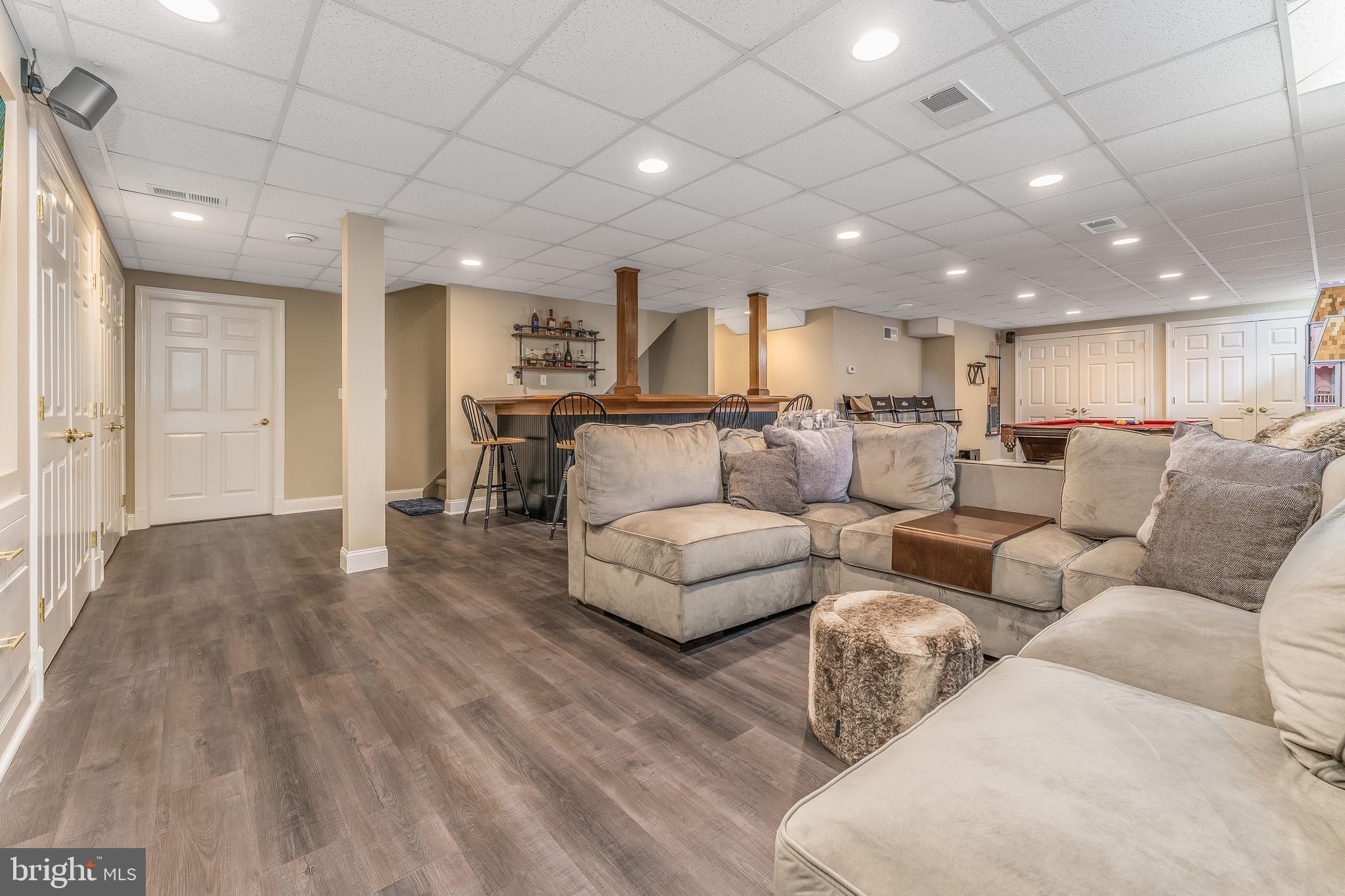27 Milestone Drive Ringoes, NJ 08551 - Photo 46 of 75 a living room with furniture and kitchen view