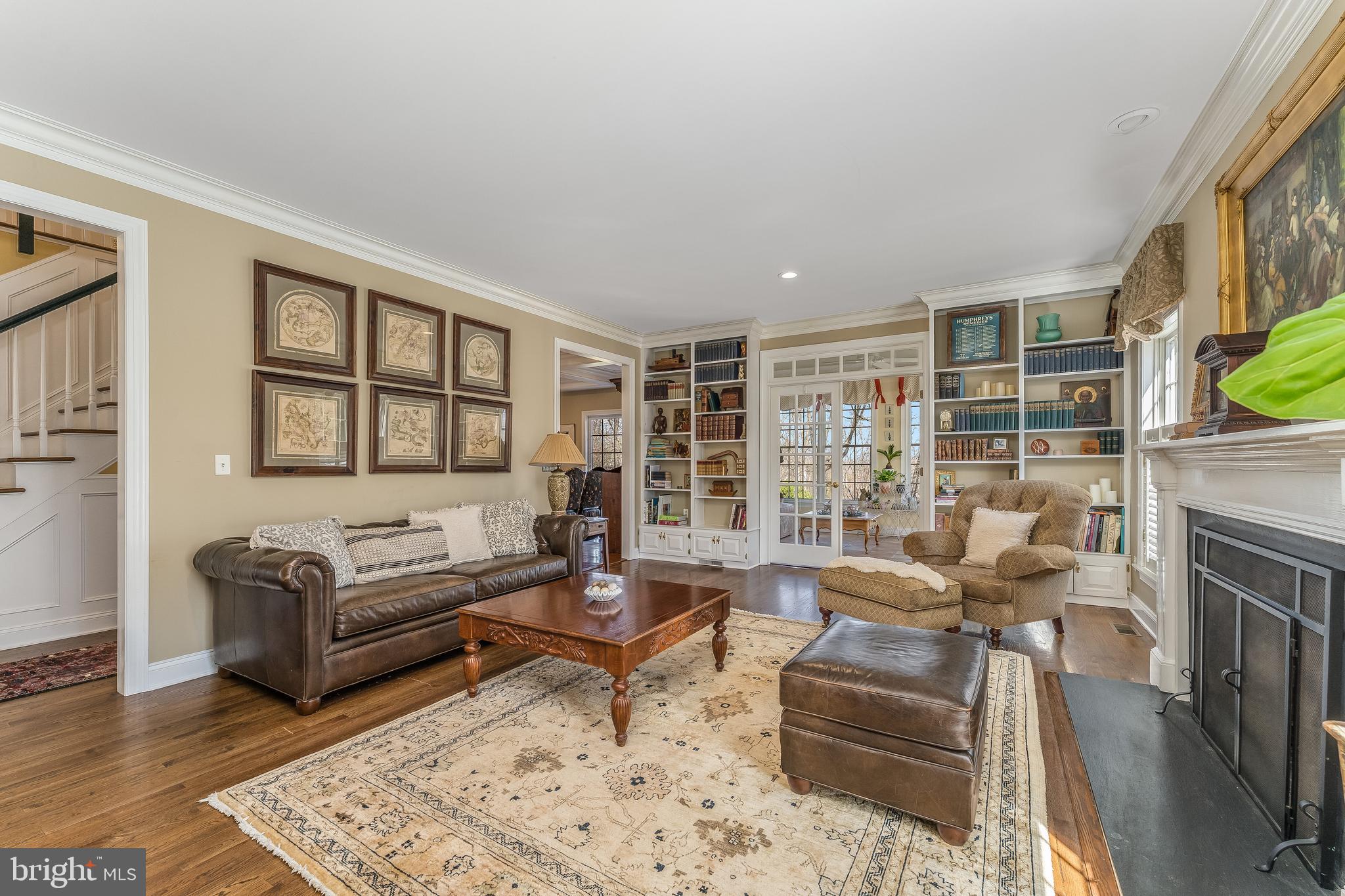 27 Milestone Drive Ringoes, NJ 08551 - Photo 10 of 75 a living room with furniture and a fireplace