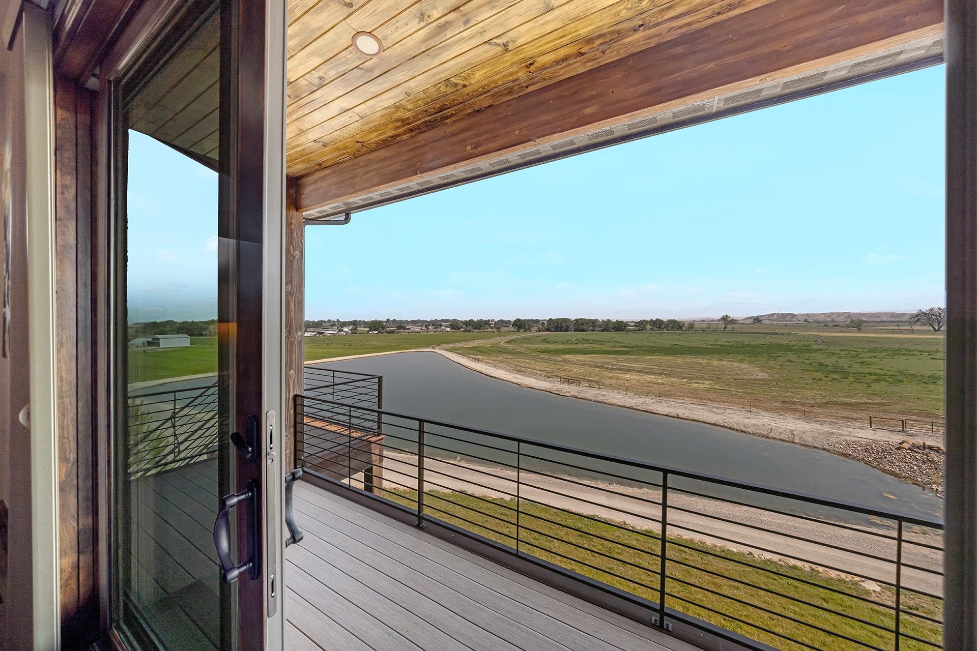 2440 J Road Grand Junction, CO 81505 - Photo 38 of 42 a view of ocean from a balcony