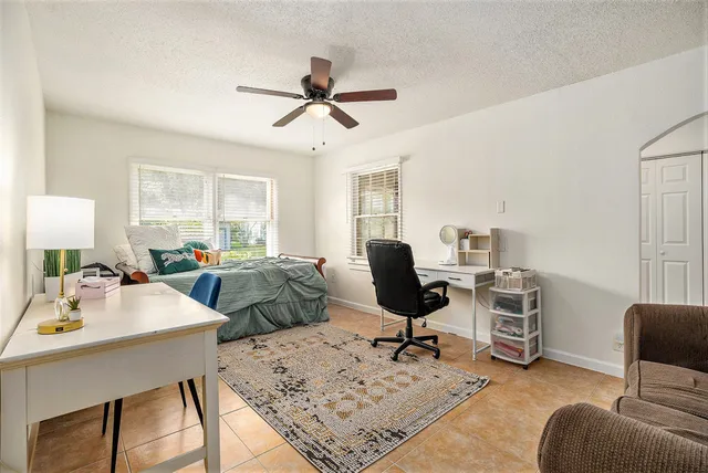a bathroom with a sink a mirror and a toilet