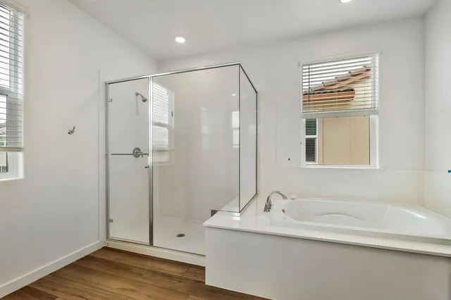 a bathroom with a sink and a shower