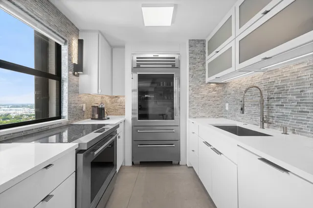 a bedroom with a bed and a night stand