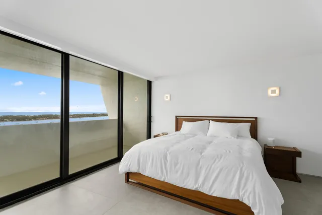 a view of balcony with furniture