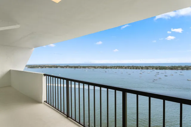 a view of a lake from a balcony