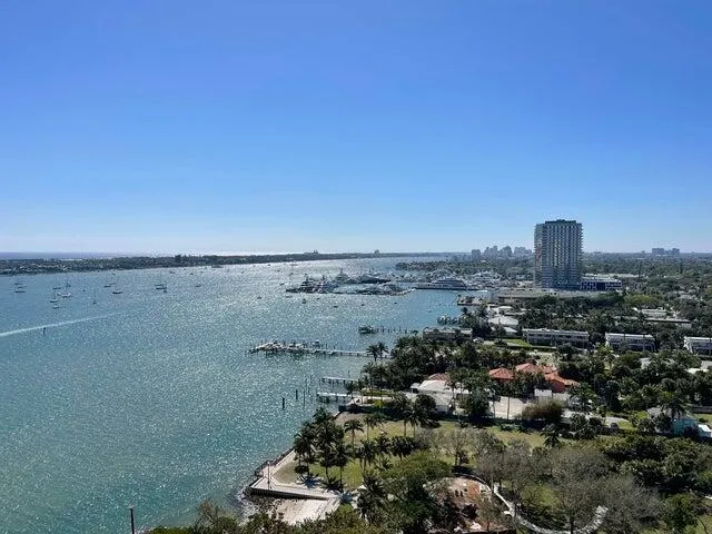 an aerial view of beach and ocean