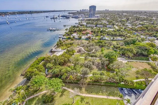 a view of front of a house with a garden