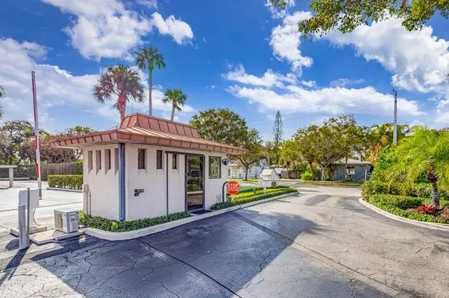 a view of a park that has a sign on it