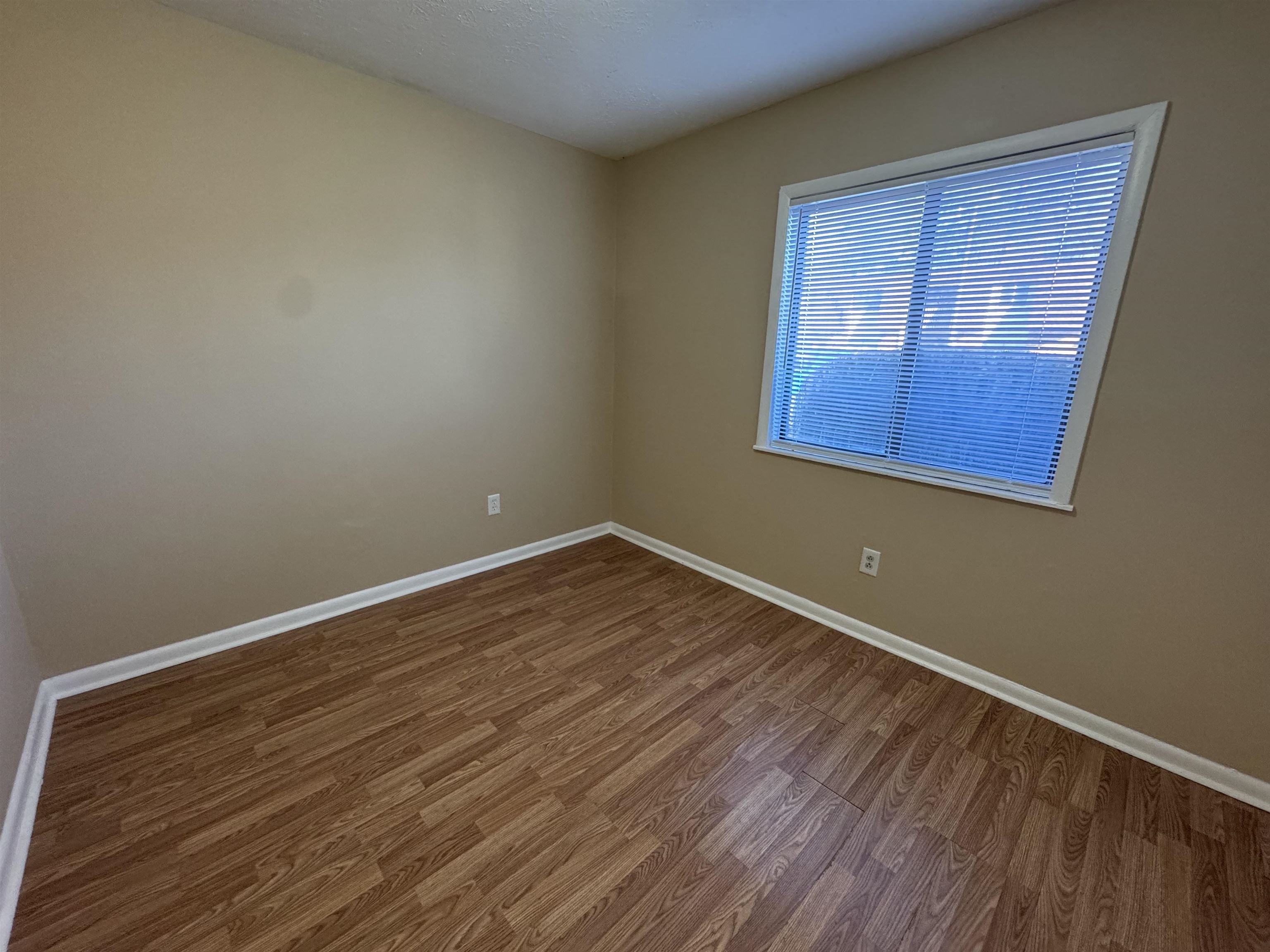 615 Carter Lane, Unit C2 Conway, SC 29526 - Photo 6 of 9 Empty room with wood finished floors and baseboards