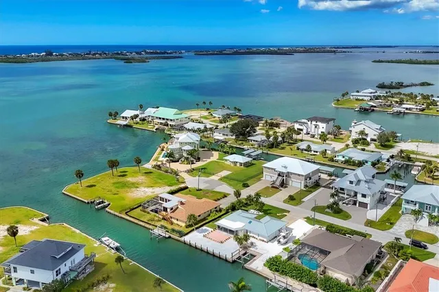 a view of a swimming pool with an outdoor seating and yard