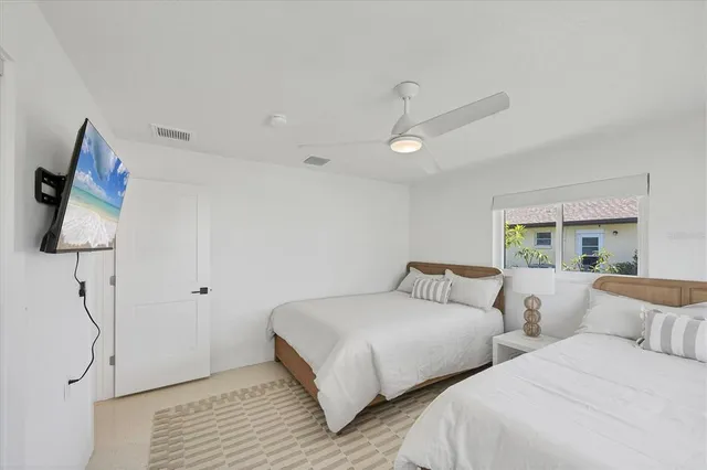 a view of a bathroom with shower curtain