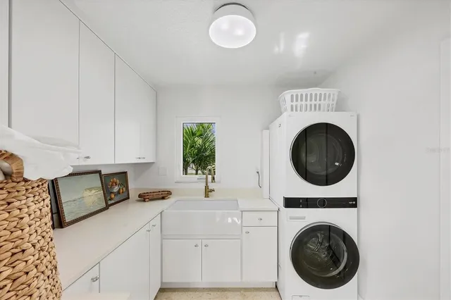 a outdoor view with a sitting space and large trees