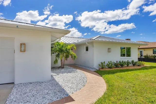 a living room with a couch and a table