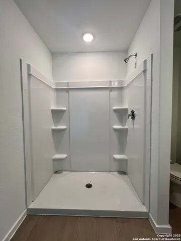 a view of a house with backyard and porch