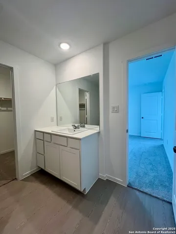 a sign that is sitting in front of a house