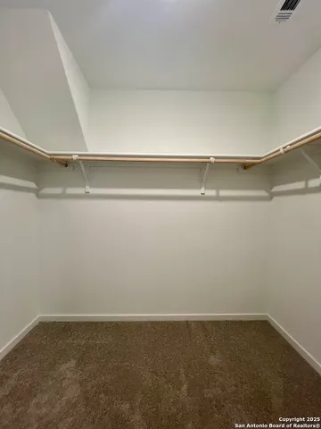 a view of a chair and city view