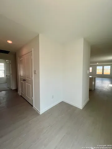 a view of hallway with livingroom