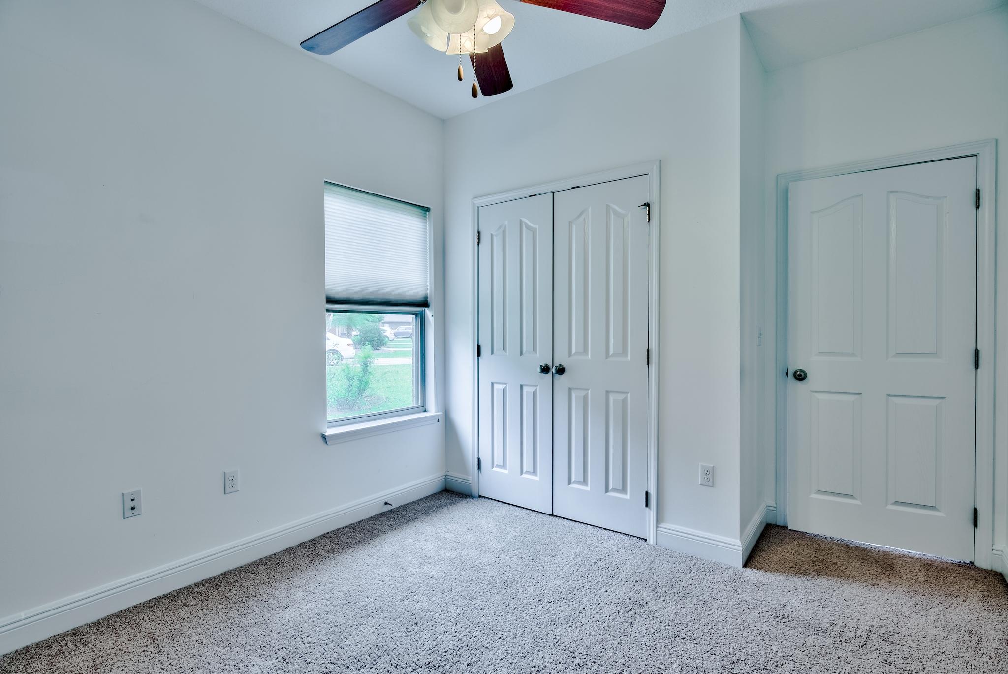 70 Riverbirch Loop Santa Rosa Beach, FL 32459 - Photo 18 of 45 an empty room with windows and fan