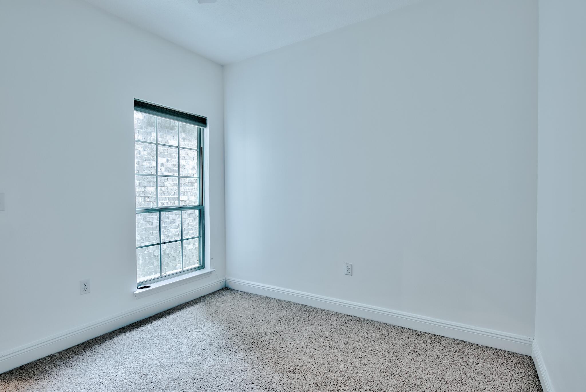 70 Riverbirch Loop Santa Rosa Beach, FL 32459 - Photo 20 of 45 an empty room with windows