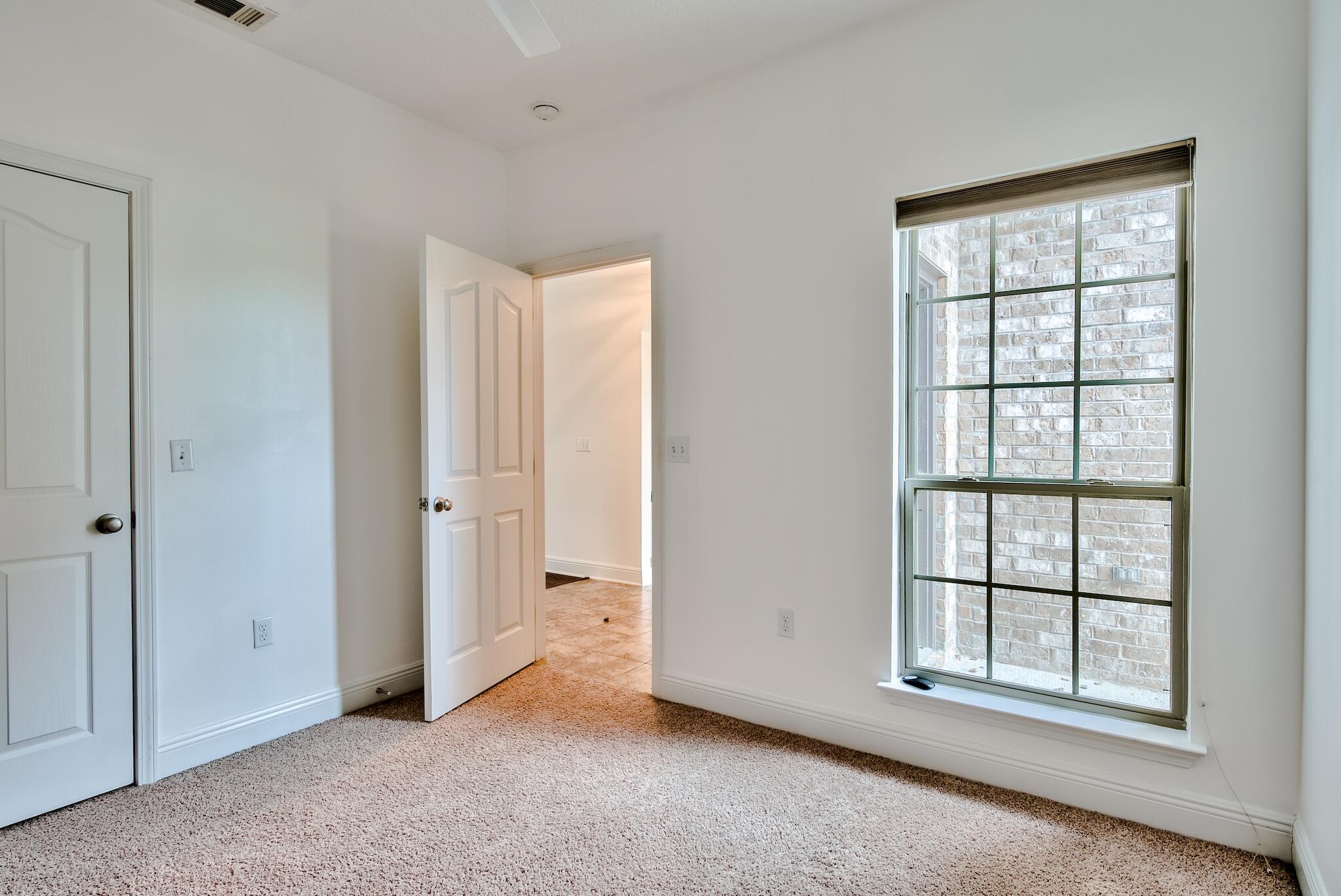 70 Riverbirch Loop Santa Rosa Beach, FL 32459 - Photo 21 of 45 an empty room with windows