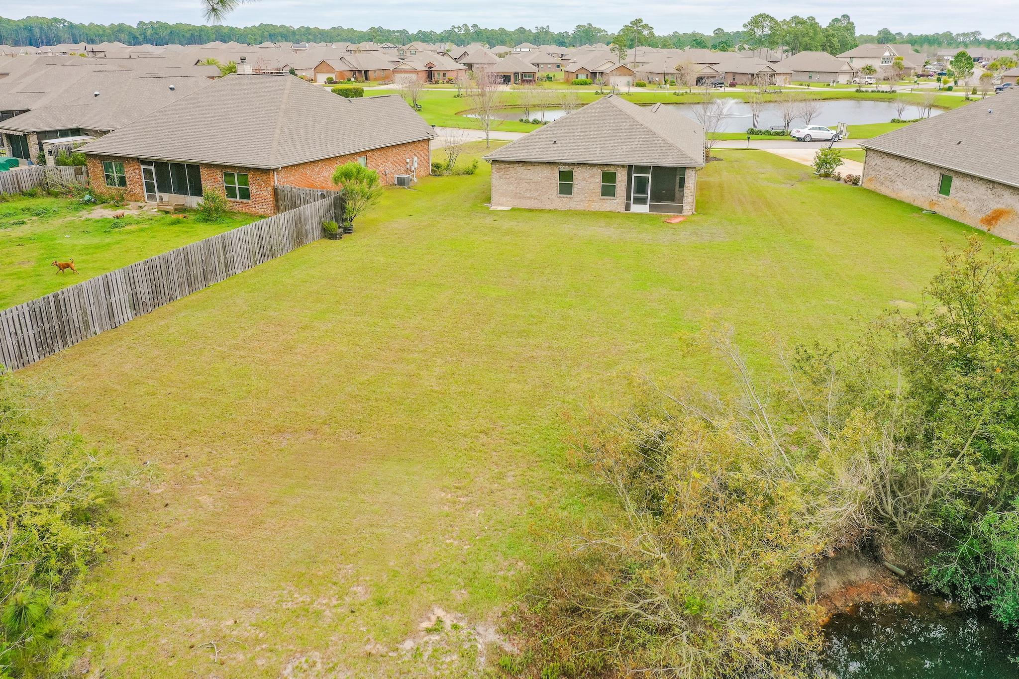 70 Riverbirch Loop Santa Rosa Beach, FL 32459 - Photo 28 of 45 an aerial view of residential houses with outdoor space and swimming pool