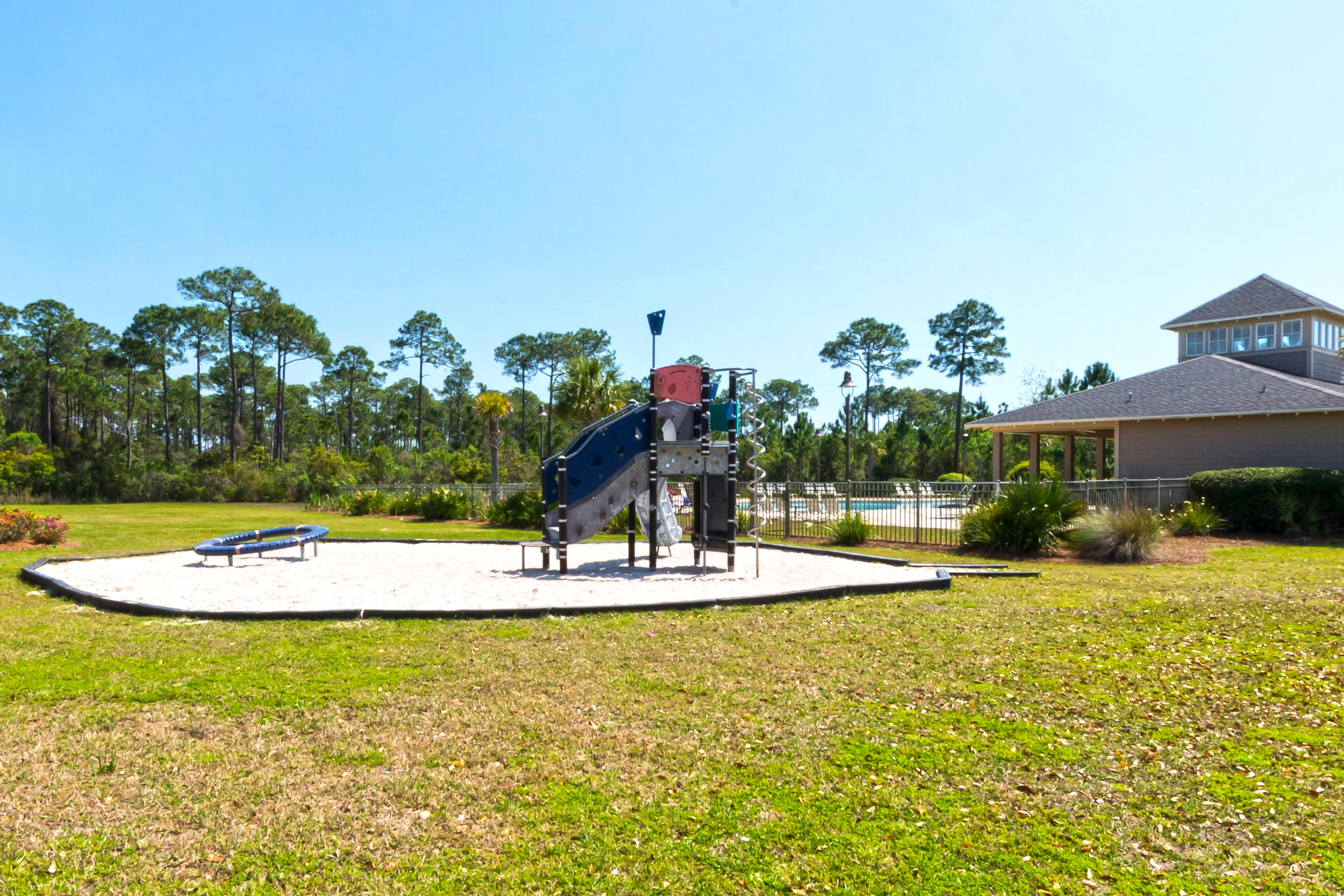 70 Riverbirch Loop Santa Rosa Beach, FL 32459 - Photo 36 of 45 a view of a swimming pool with a yard