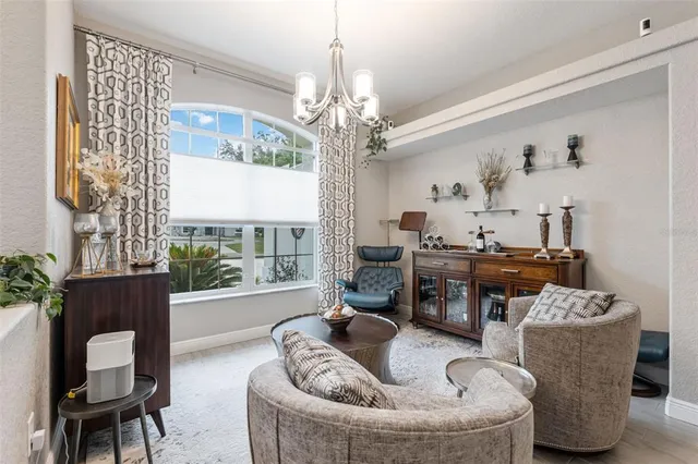 a kitchen with granite countertop a sink cabinets and stainless steel appliances