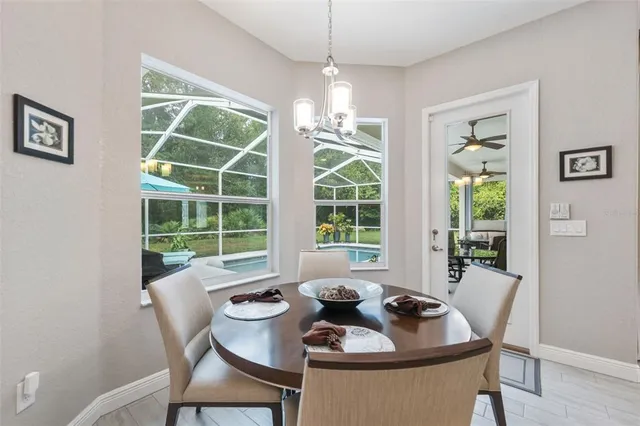 a bedroom with a bed and a chair