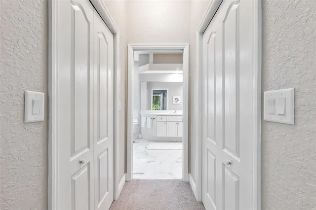 a view of a swimming pool with a lounge chair