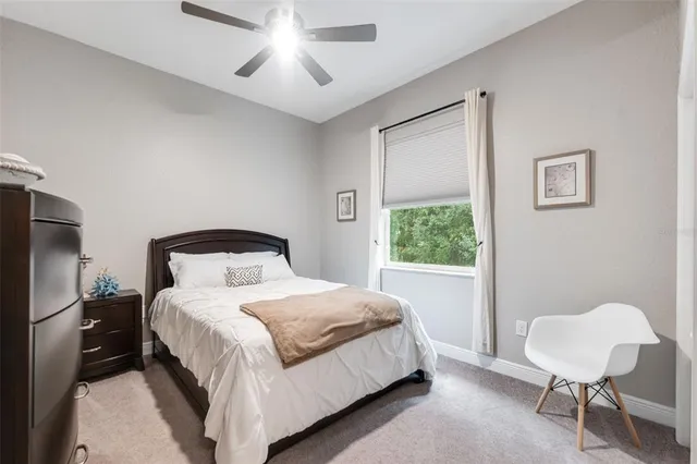 a house view with a sitting space and garden