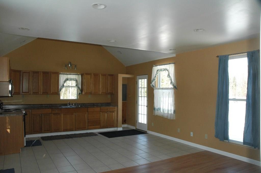 32 Whitten Road Clinton, ME 04927 - Photo 4 of 12 Kitchen with cathedral ceiling.