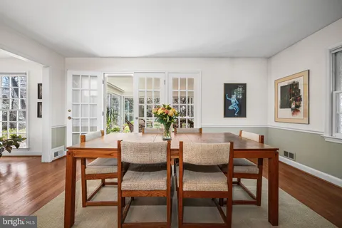 a kitchen with a stove a sink and a microwave