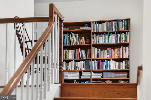 a view of a chairs on wooden deck