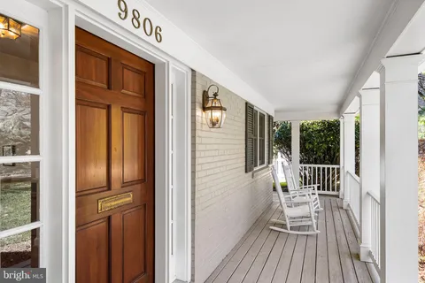 a view of a living room with wooden floor
