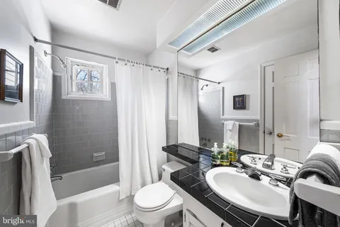 a sign on the wall of the building