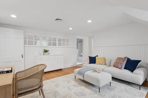 a living room with furniture and a couch