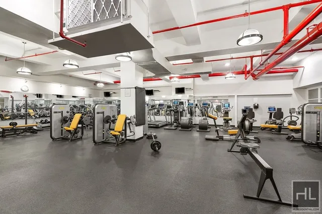 a view of a patio with a dining table and chairs