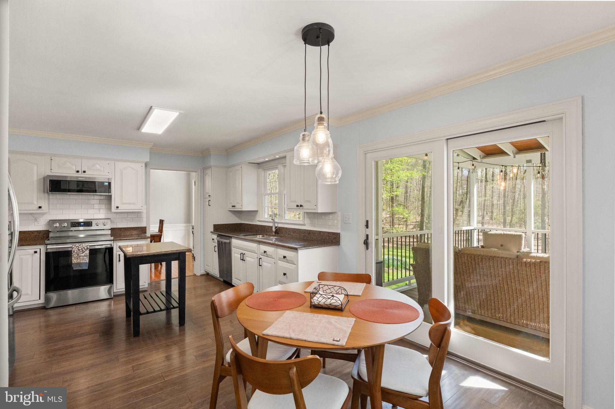 8019 Stillbrooke Road Manassas, VA 20112 - Photo 14 of 80 Kitchen overlooking private, rear acreage.