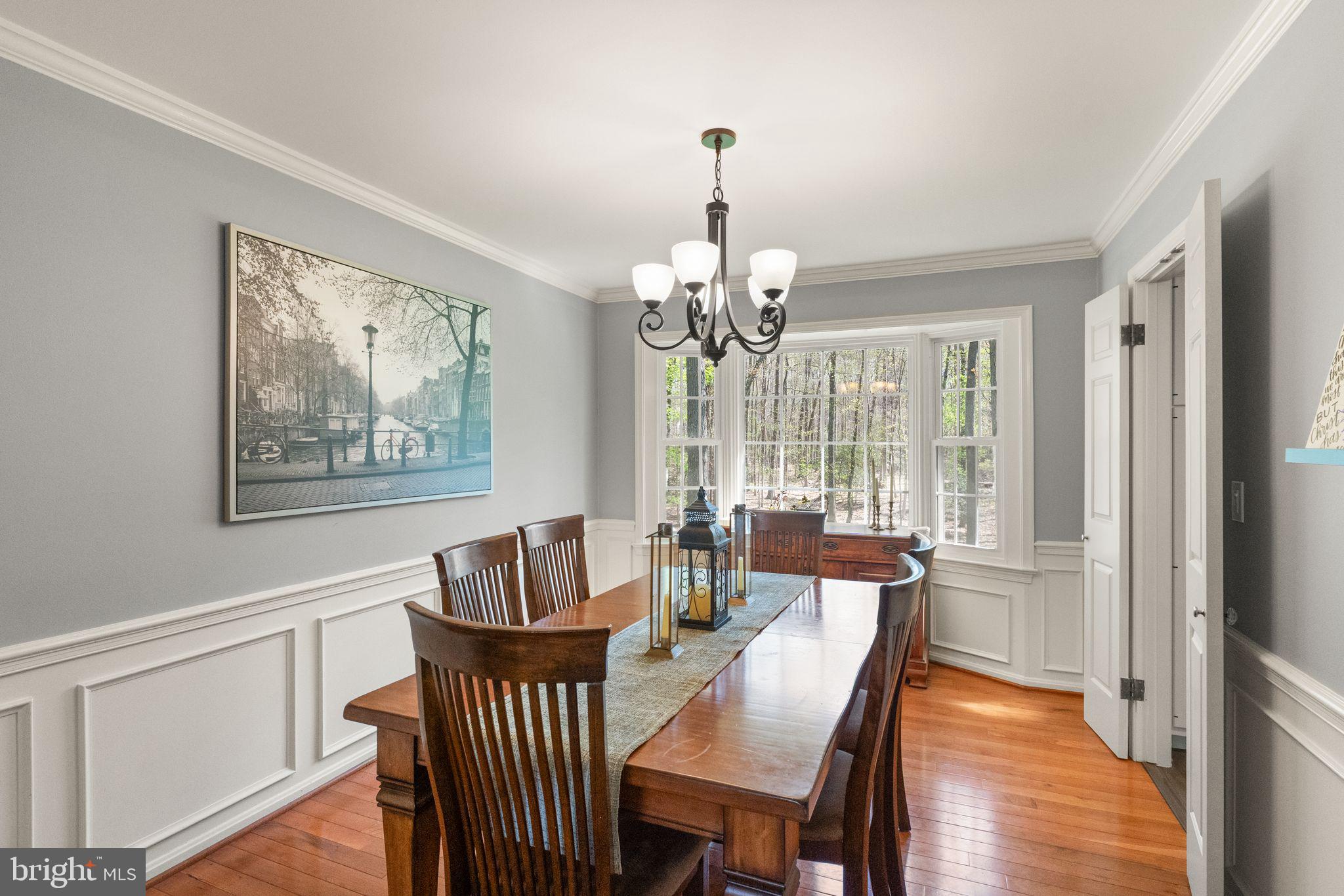 8019 Stillbrooke Road Manassas, VA 20112 - Photo 19 of 80 Formal dining ares with beautiful trim.