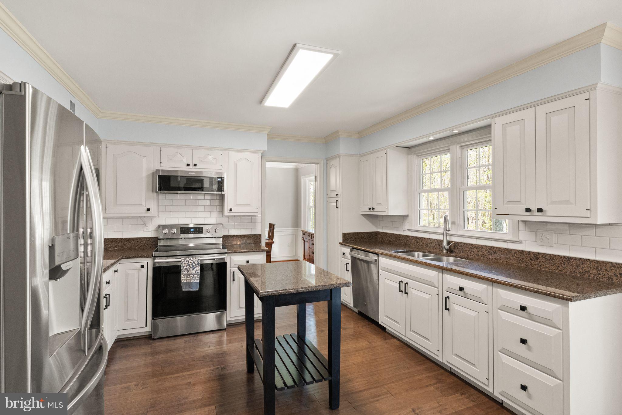 8019 Stillbrooke Road Manassas, VA 20112 - Photo 3 of 80 Updated kitchen with plenty of storage.