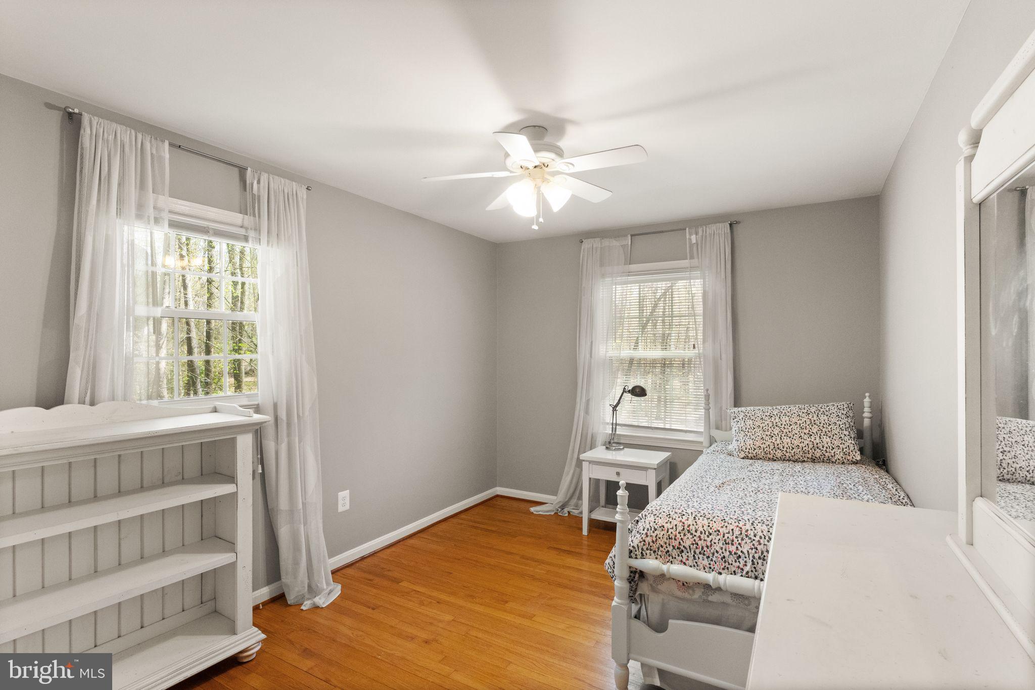 8019 Stillbrooke Road Manassas, VA 20112 - Photo 40 of 80 Upstairs bedroom 4 with hardwoods.