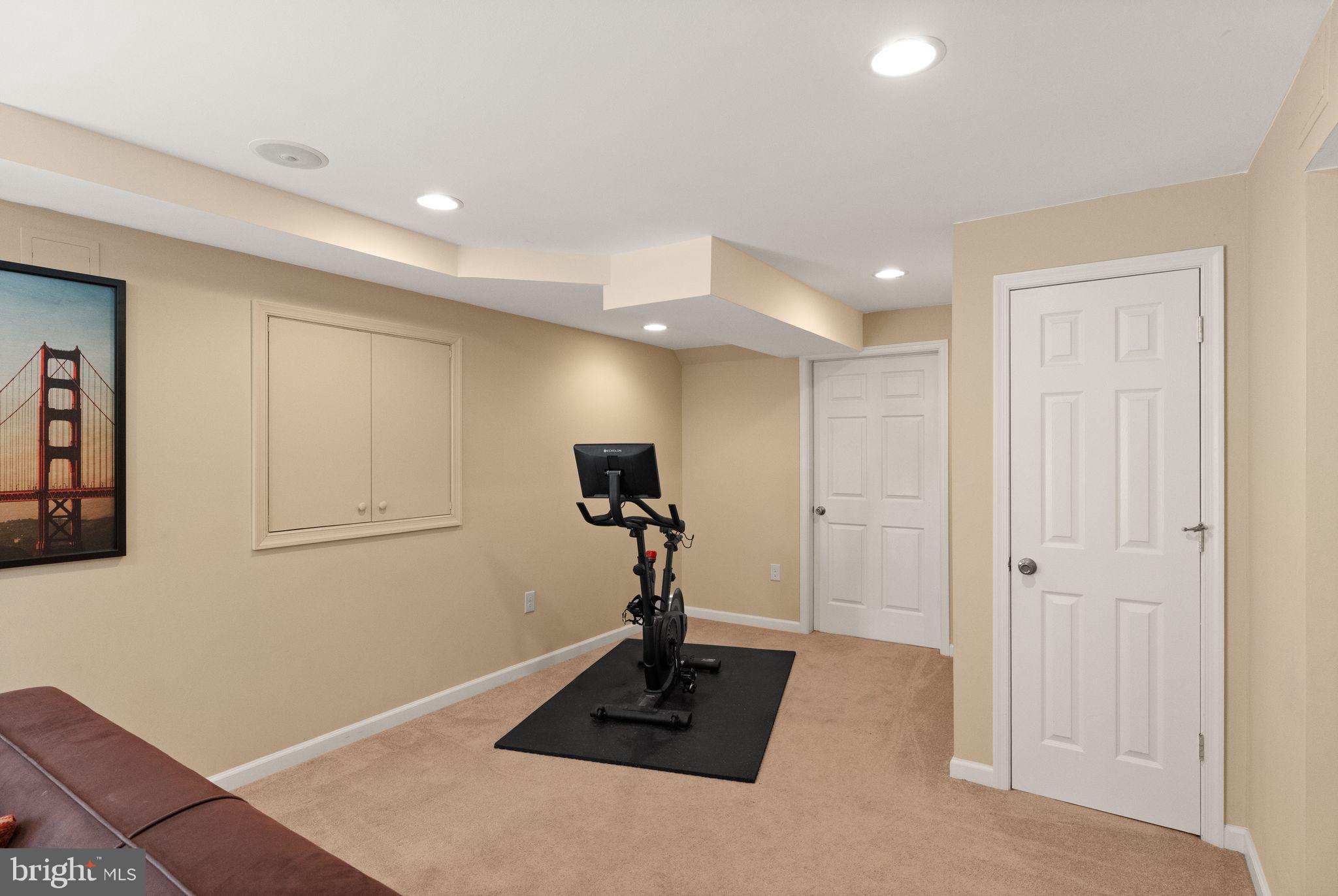 8019 Stillbrooke Road Manassas, VA 20112 - Photo 52 of 80 Room in basement for games/gym equipment.