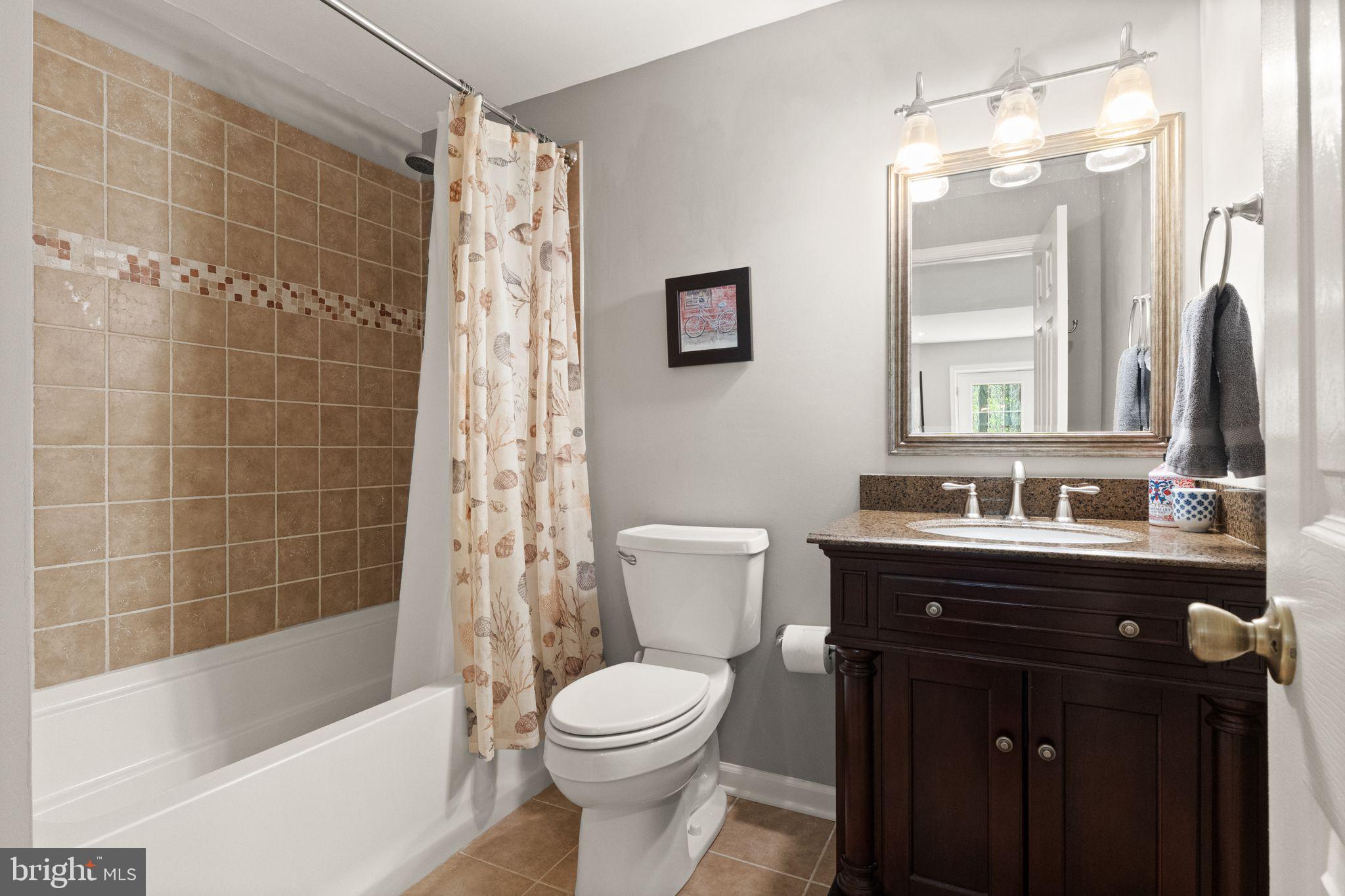 8019 Stillbrooke Road Manassas, VA 20112 - Photo 53 of 80 Full, updated bathroom in the basement.