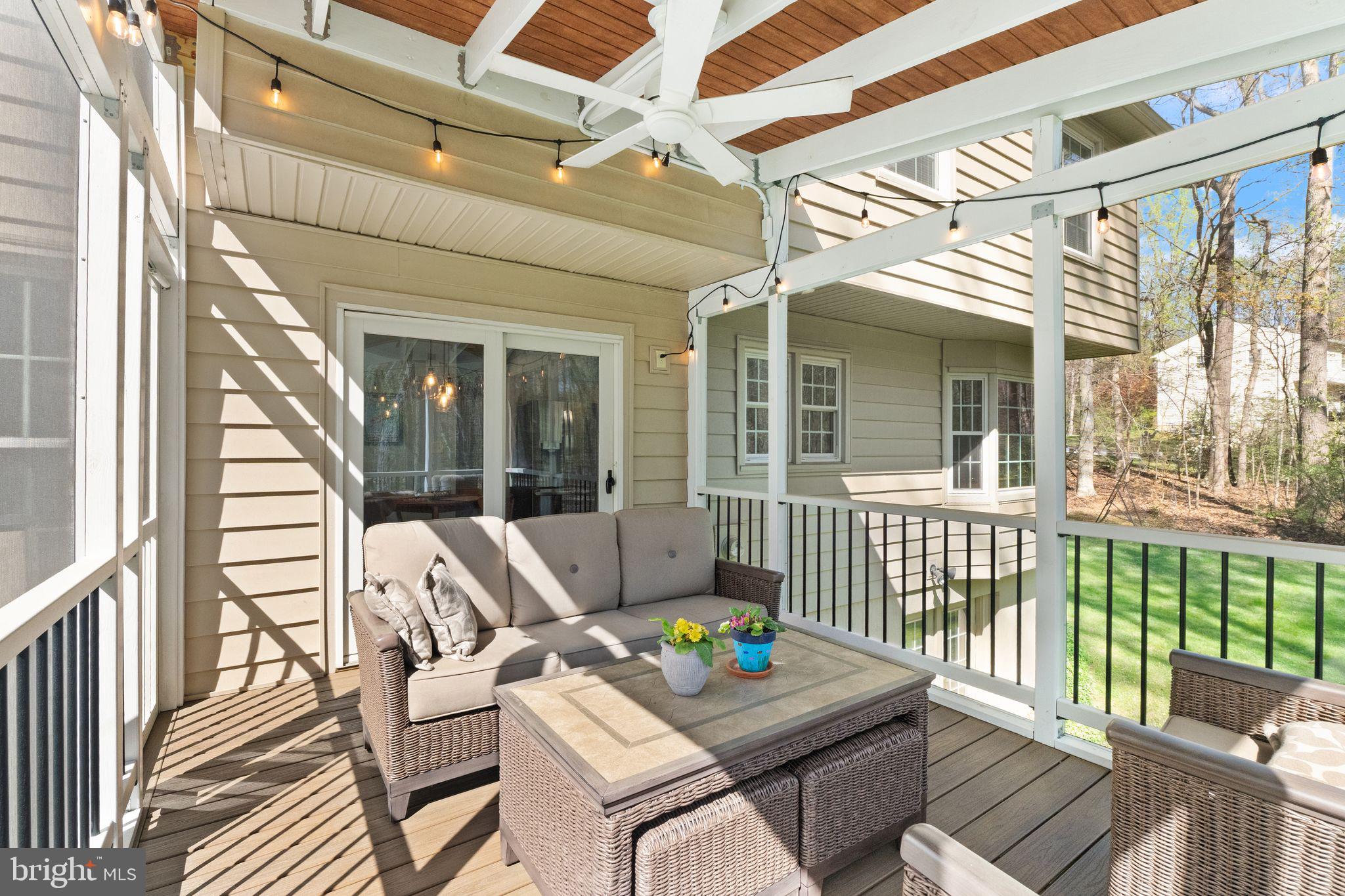 8019 Stillbrooke Road Manassas, VA 20112 - Photo 59 of 80 Screened-in porch with kitchen access.