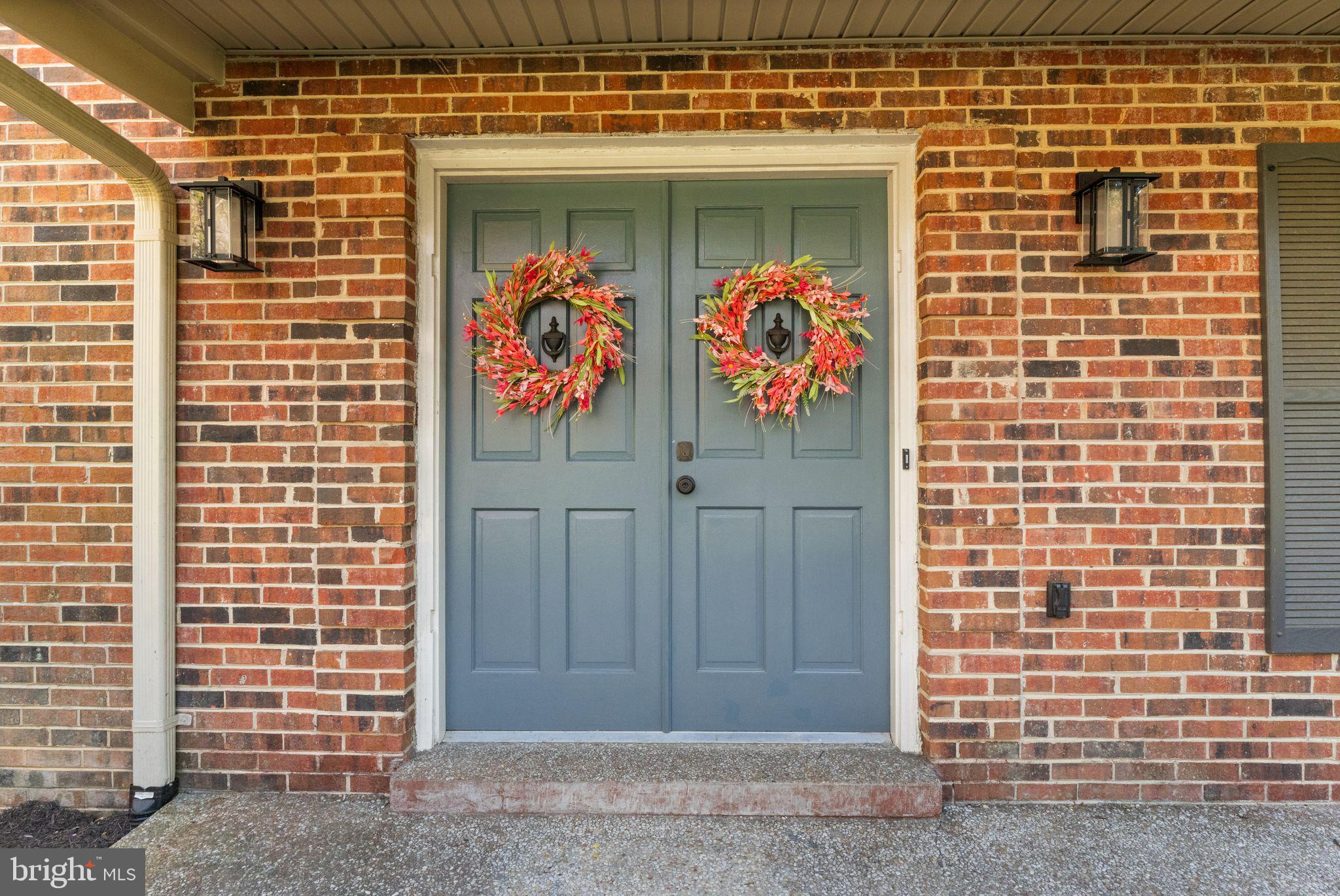 8019 Stillbrooke Road Manassas, VA 20112 - Photo 6 of 80 Charming front entrance with covered walk.