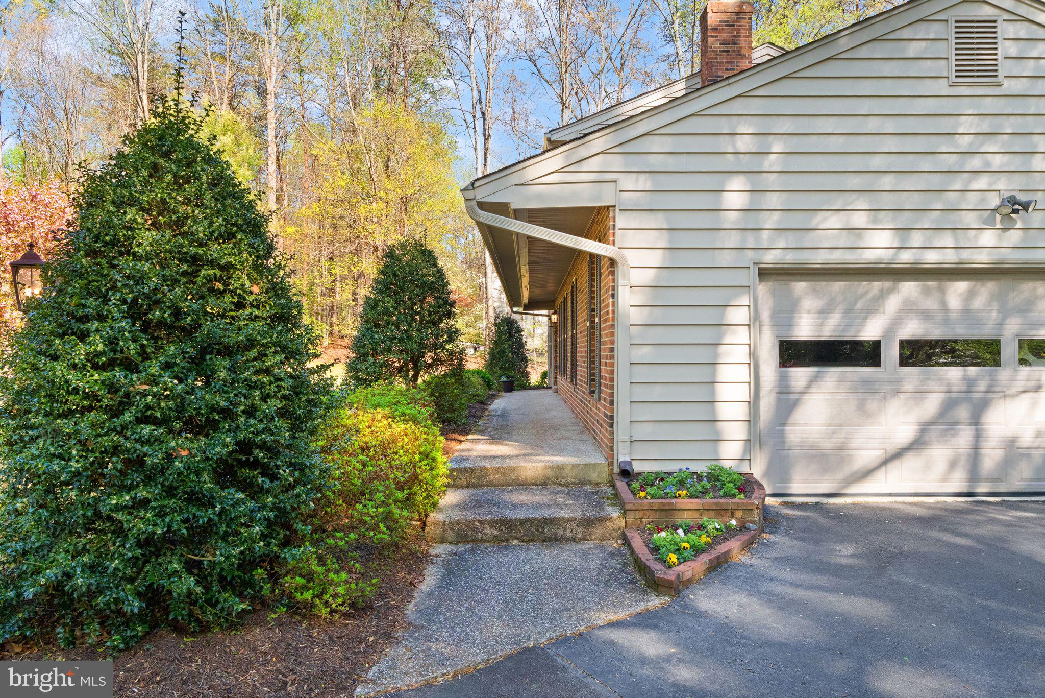 8019 Stillbrooke Road Manassas, VA 20112 - Photo 75 of 80 Covered walk to the front door.