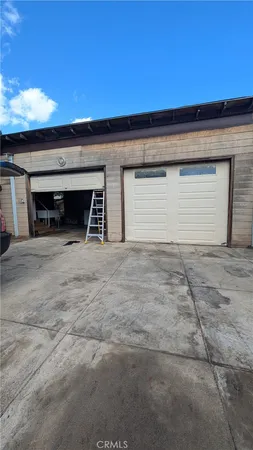 a view of a backyard of the house