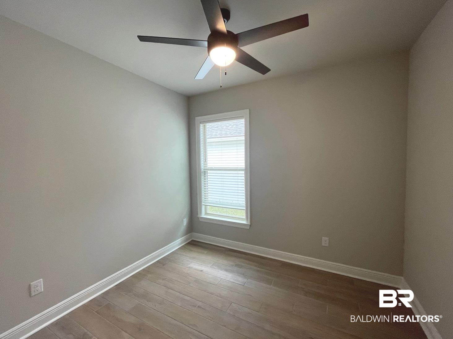 1412 Fenton Circle Foley, AL 36535 - Photo 6 of 15 Unfurnished room featuring ceiling fan and light wood-type flooring