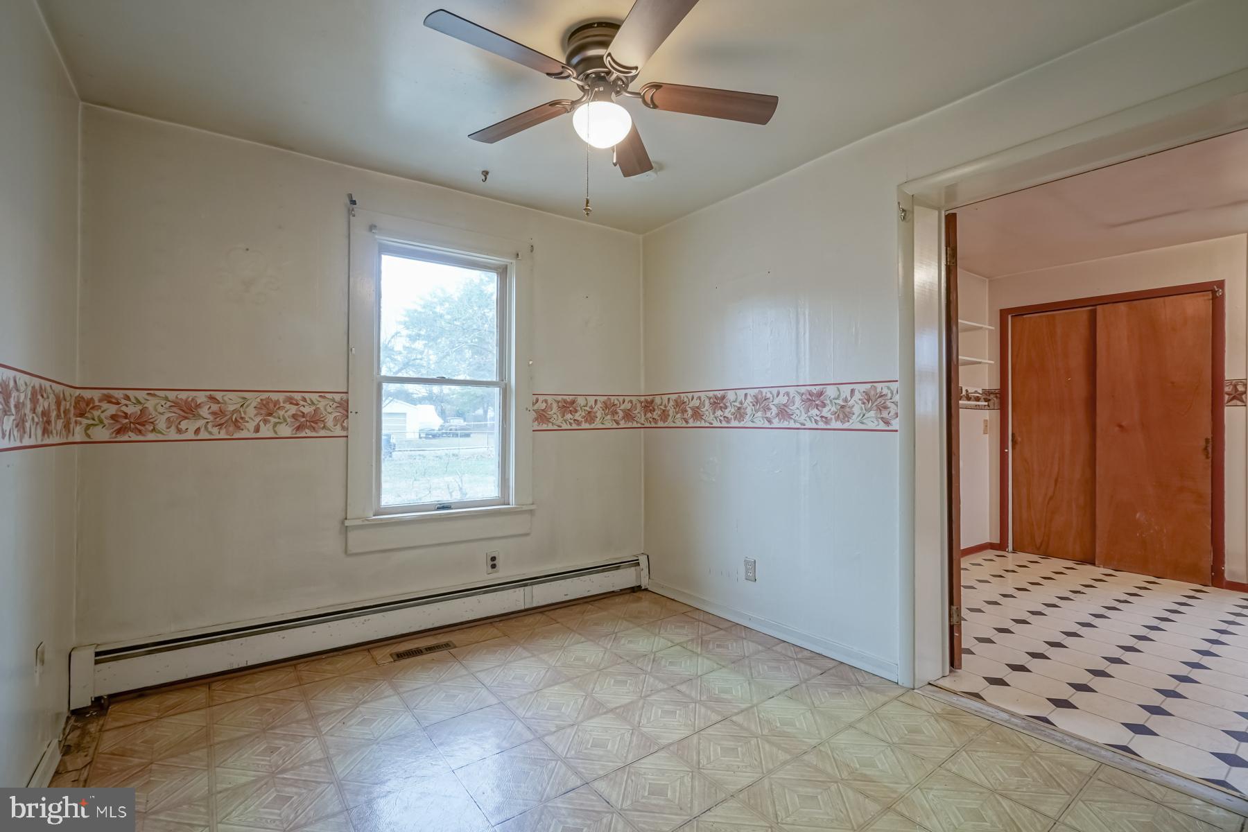 32 Tilbury Road Salem, NJ 08079 - Photo 10 of 30 a view of an empty room with a window