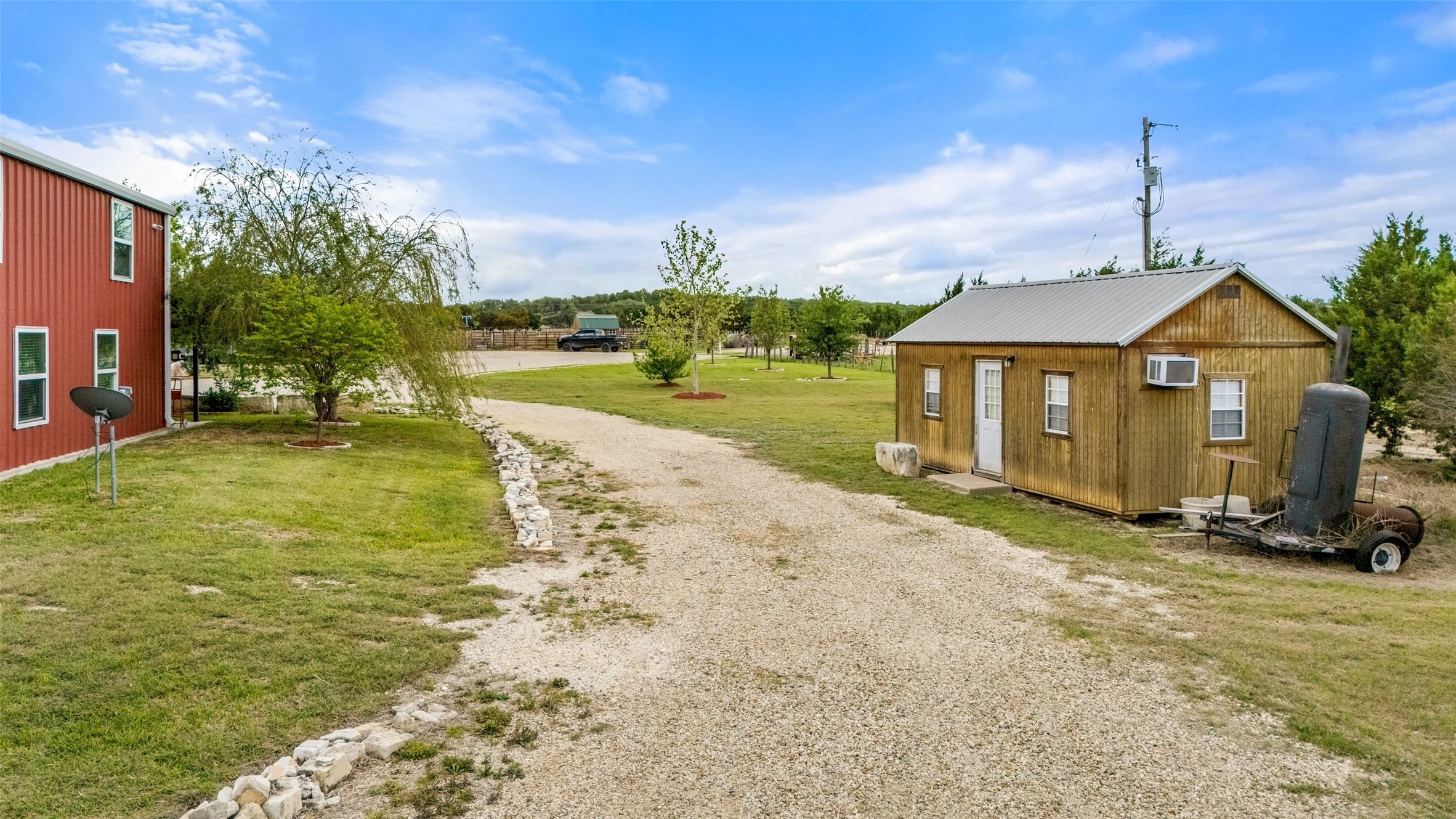 1301 County Road 228 Florence, TX 76527 - Photo 6 of 40 a front view of a house with a yard